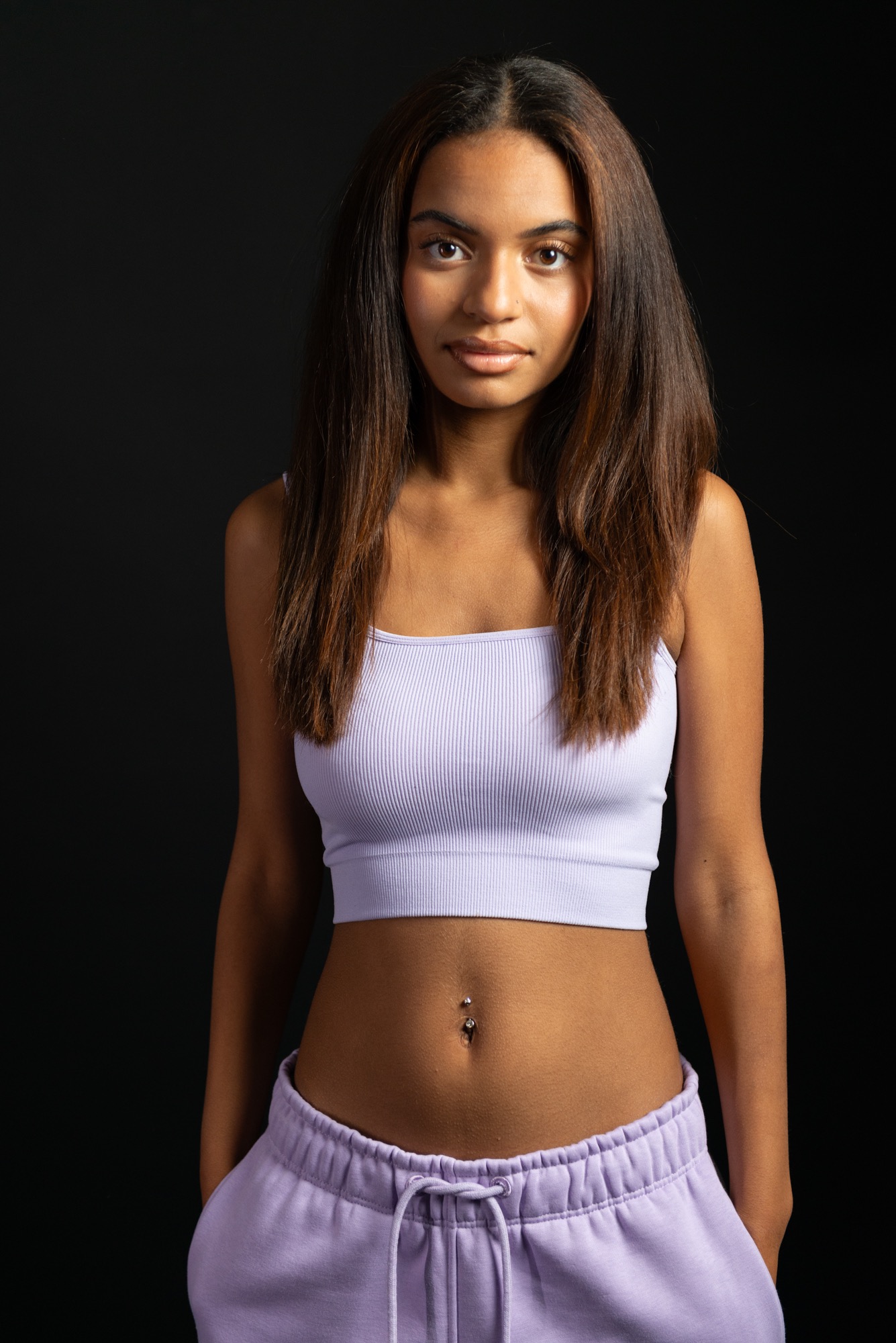 Model in lilac Pioneer London cropped top and sweatpants