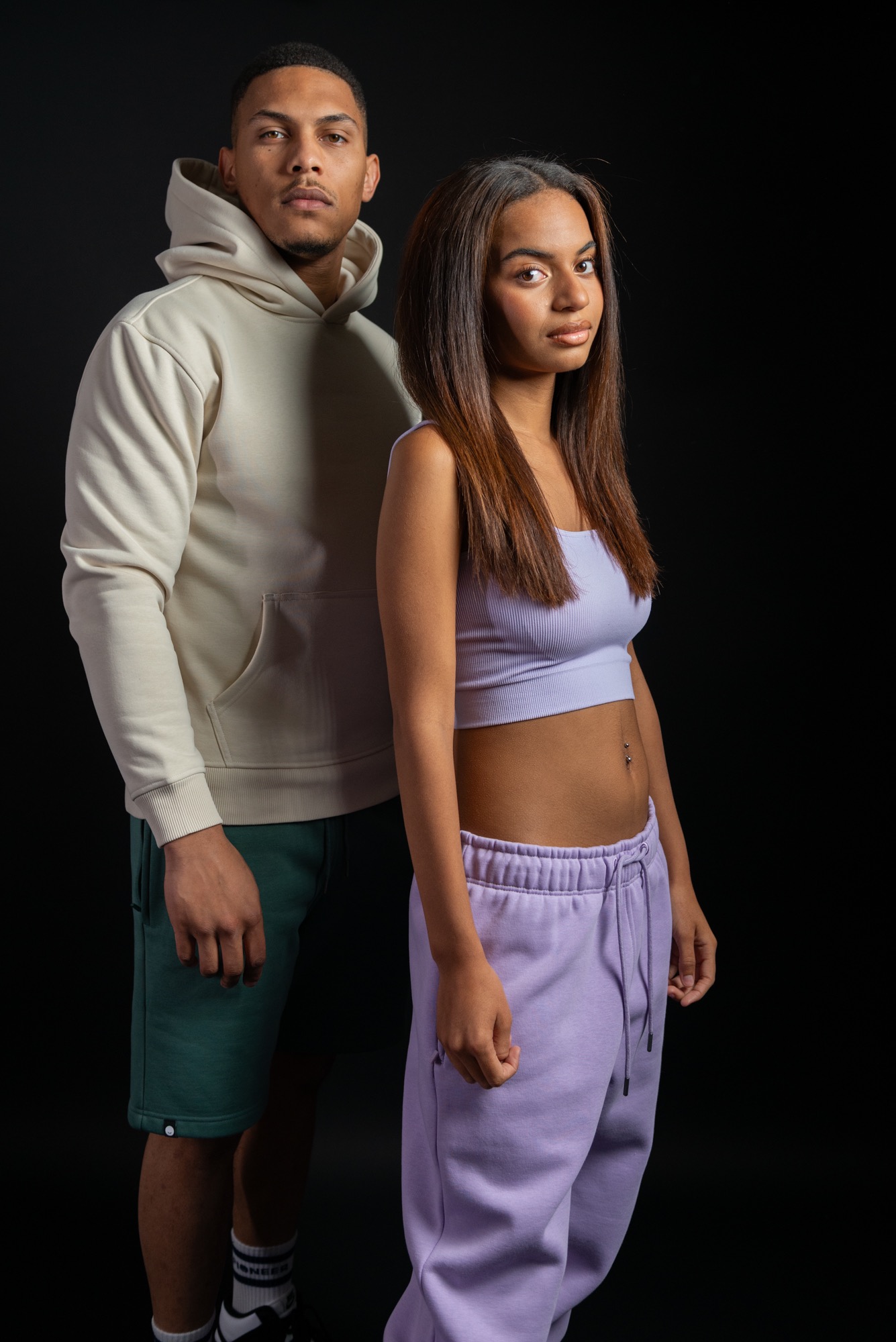 Models wearing Pioneer London hoodie and lilac coordinated sweats